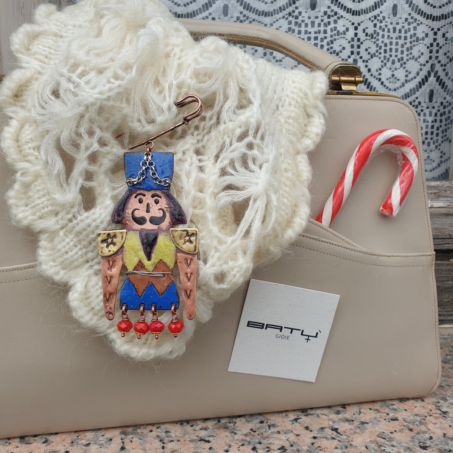 Spilla SCHIACCIANOCI