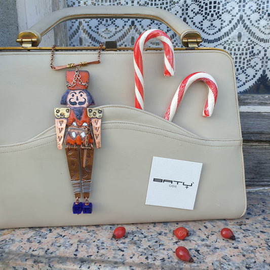 Collana SCHIACCIANOCI ARANCIONE